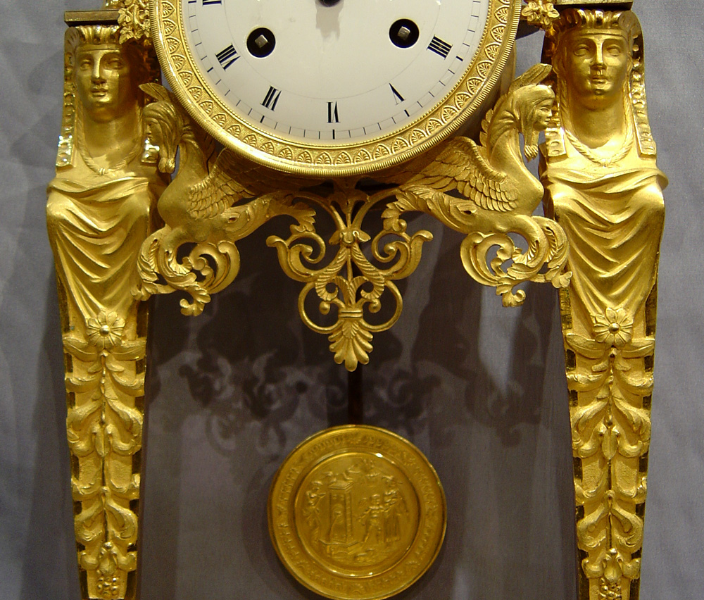 Antique French Directoire Goute D'Egypt ( Egyptian style) ormolu mantel clock.