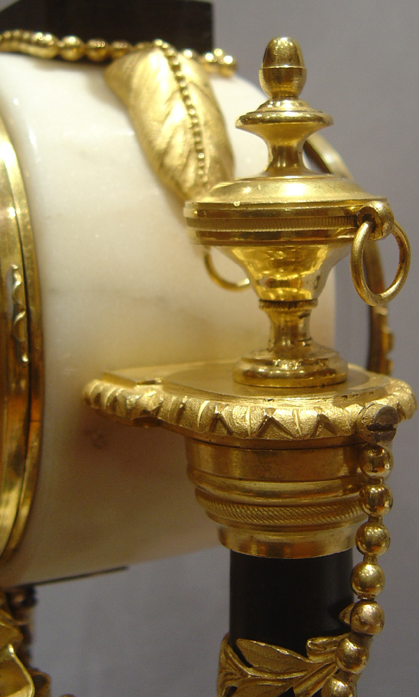French antique Louis XVIth mantel clock in white and black marble with ormolu signed Gavelle.