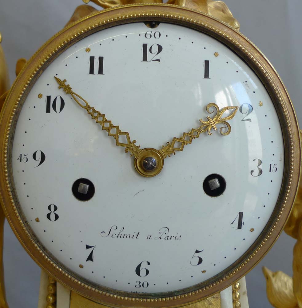 Antique French Louis XVI white marblle and ormolu mantel clock