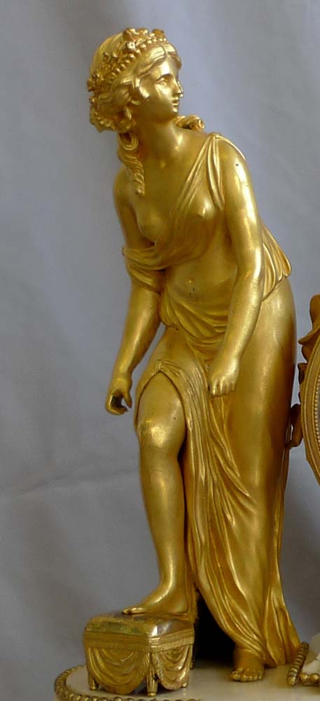 Antique French Louis XVI white marblle and ormolu mantel clock