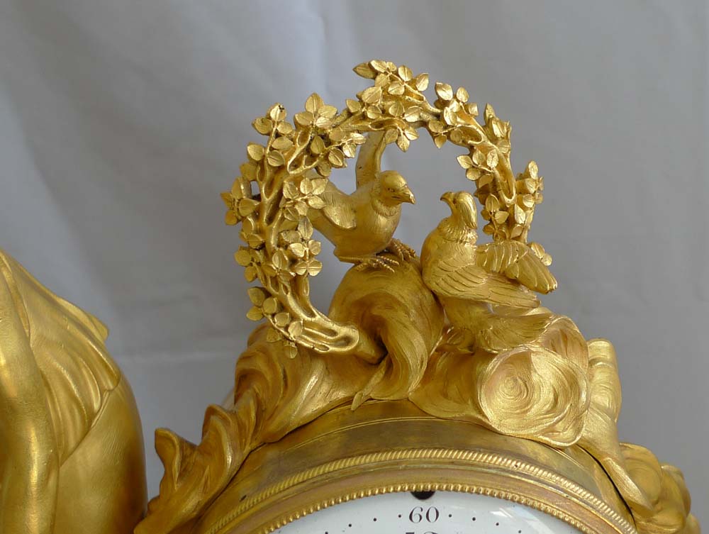 Antique French Louis XVI white marblle and ormolu mantel clock