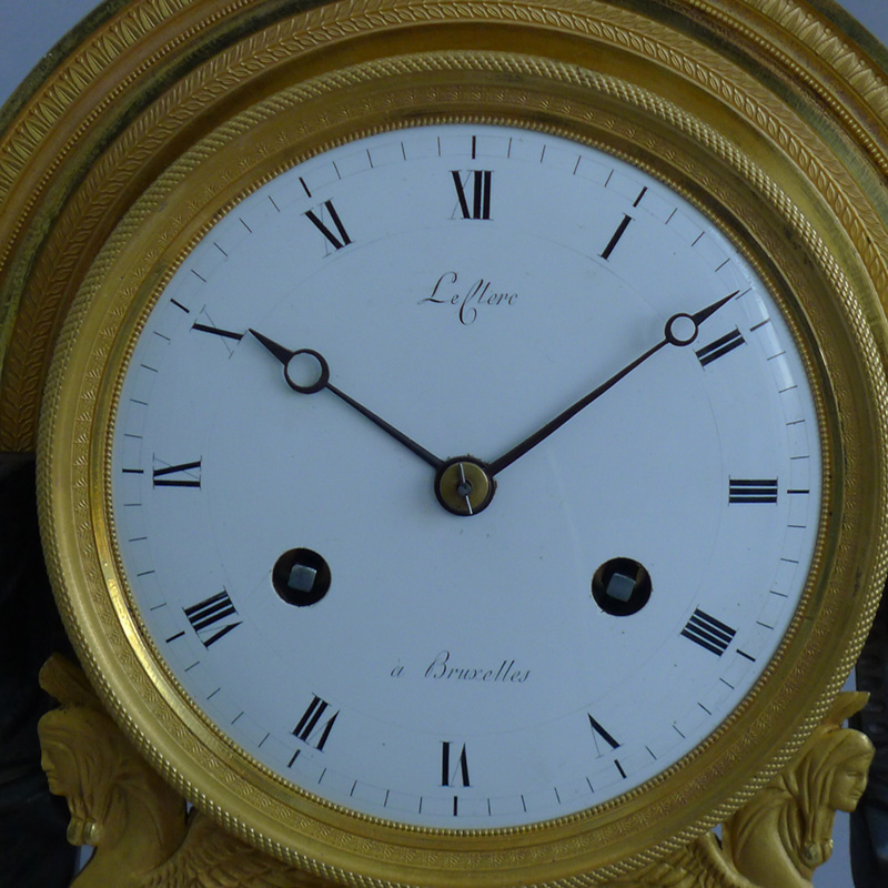 Antique French Directoire Egyptian style ormolu and patinated bronze mantel clock signed Leclerc.