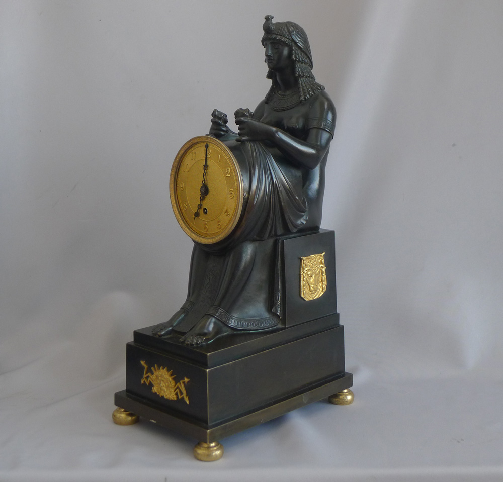 Antique English George III patinated bronze and ormolu Gout d'Egypt clock of Isis.