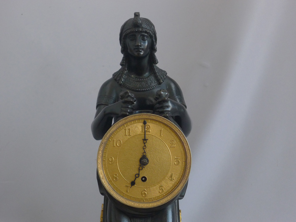 Antique English George III patinated bronze and ormolu Gout d'Egypt clock of Isis.