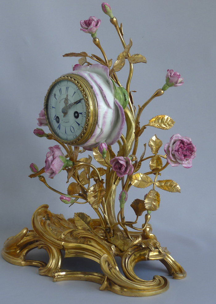 Fine Louis XVth 18th century  porcelain and ormolu mantel clock by Etienne Lenoir