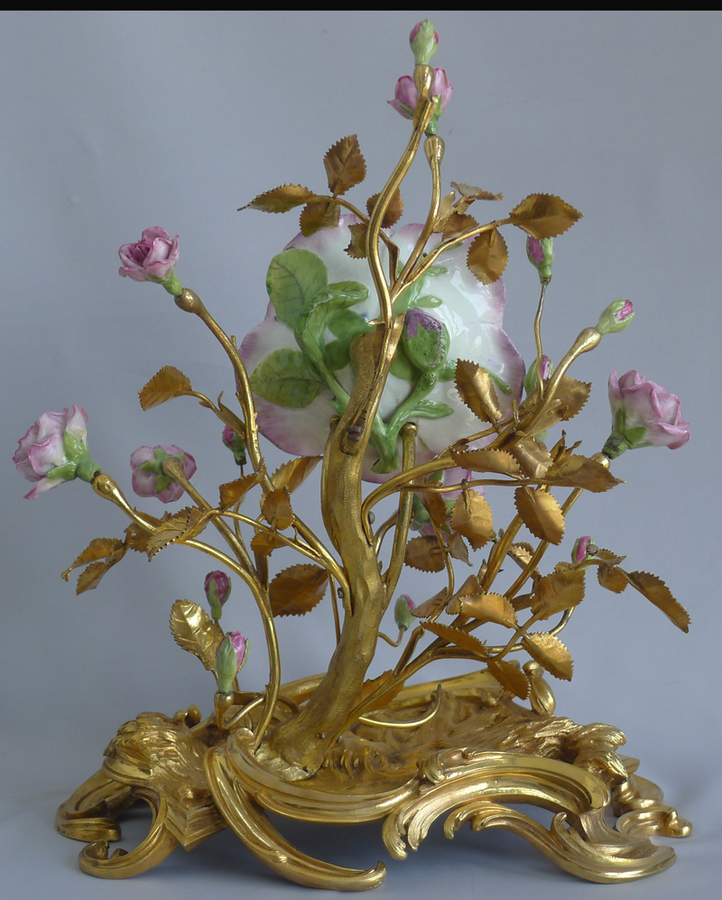 Fine Louis XVth 18th century  porcelain and ormolu mantel clock by Etienne Lenoir