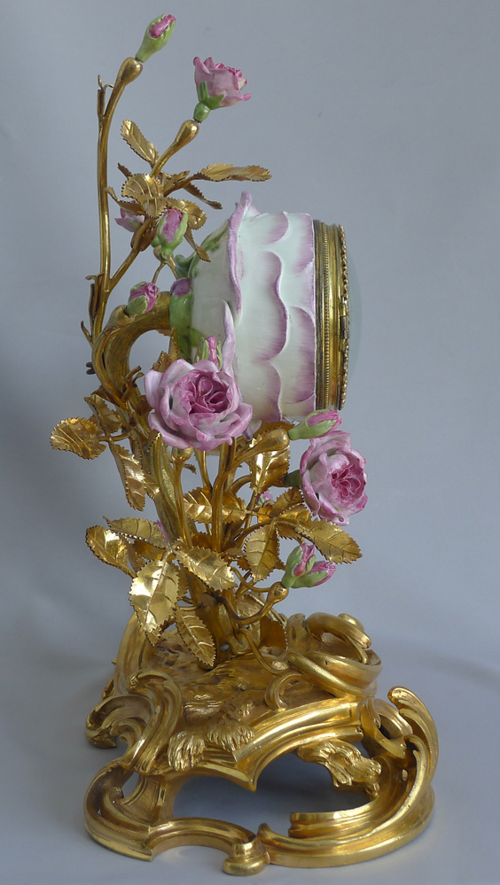 Fine Louis XVth 18th century  porcelain and ormolu mantel clock by Etienne Lenoir