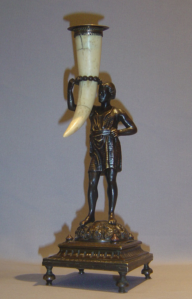 Antique blackamoor or negro candlesticks.