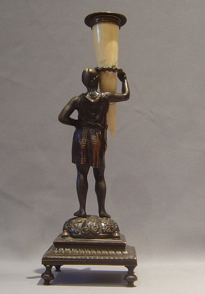 Antique blackamoor or negro candlesticks.