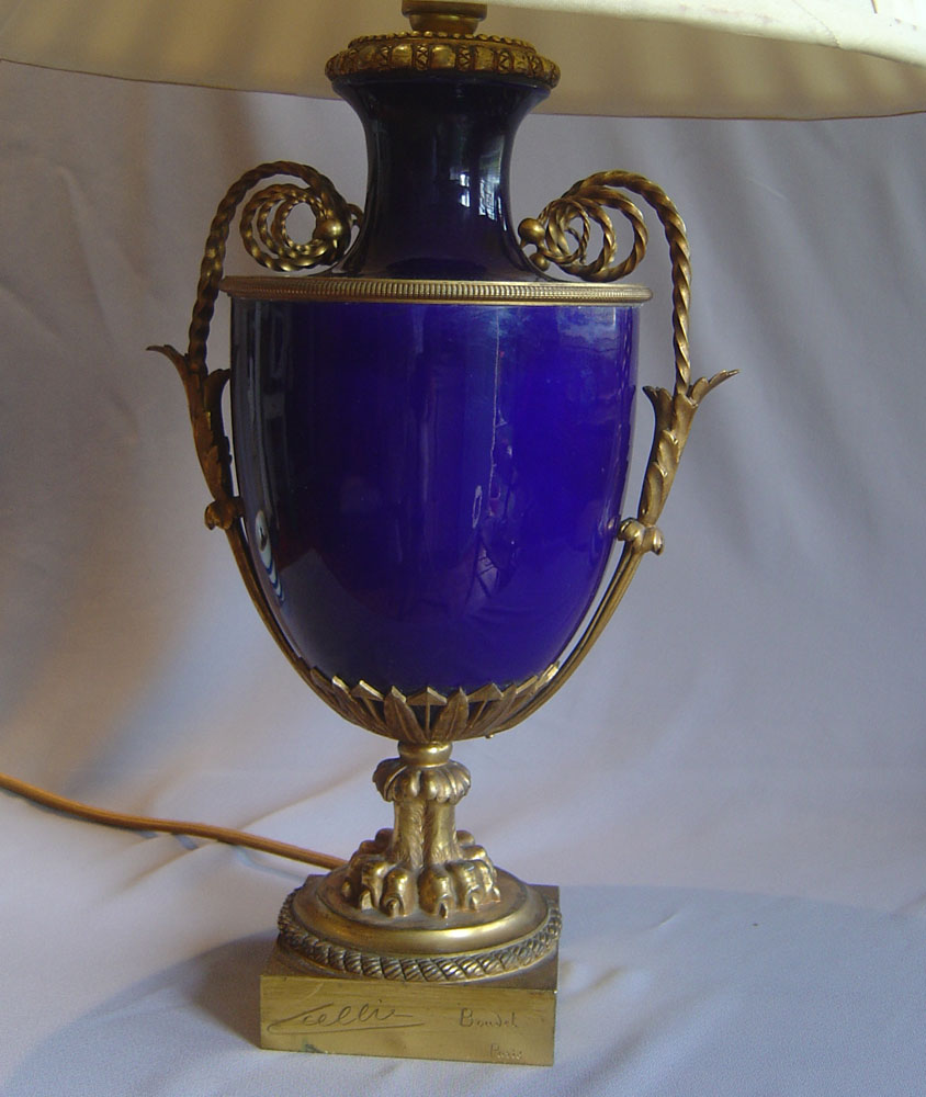 Table lamp in gilt bronze and blue porcelain signed Boudet.