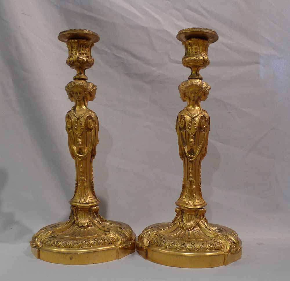 Pair of French ormolu candlesticks.