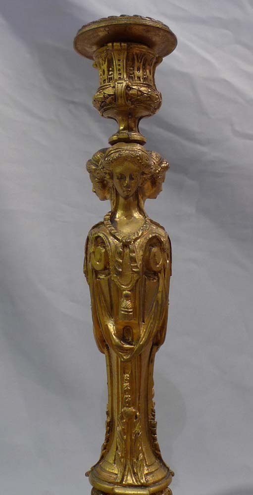 Pair of French ormolu candlesticks.