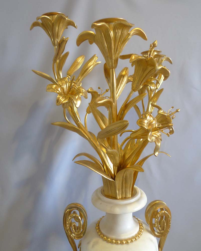 Antique candelabra, gilt bronze mounted white marble baluster shape.