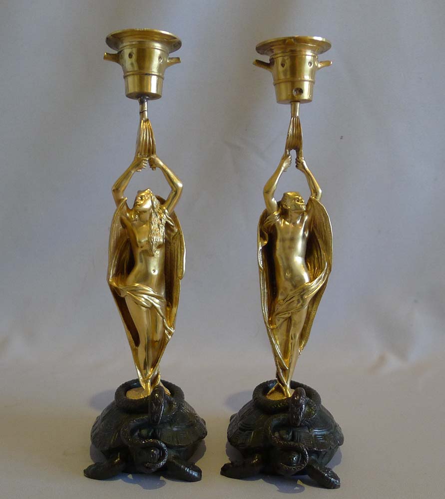 Antique pair of very unusual figural devil bronze candlesticks.