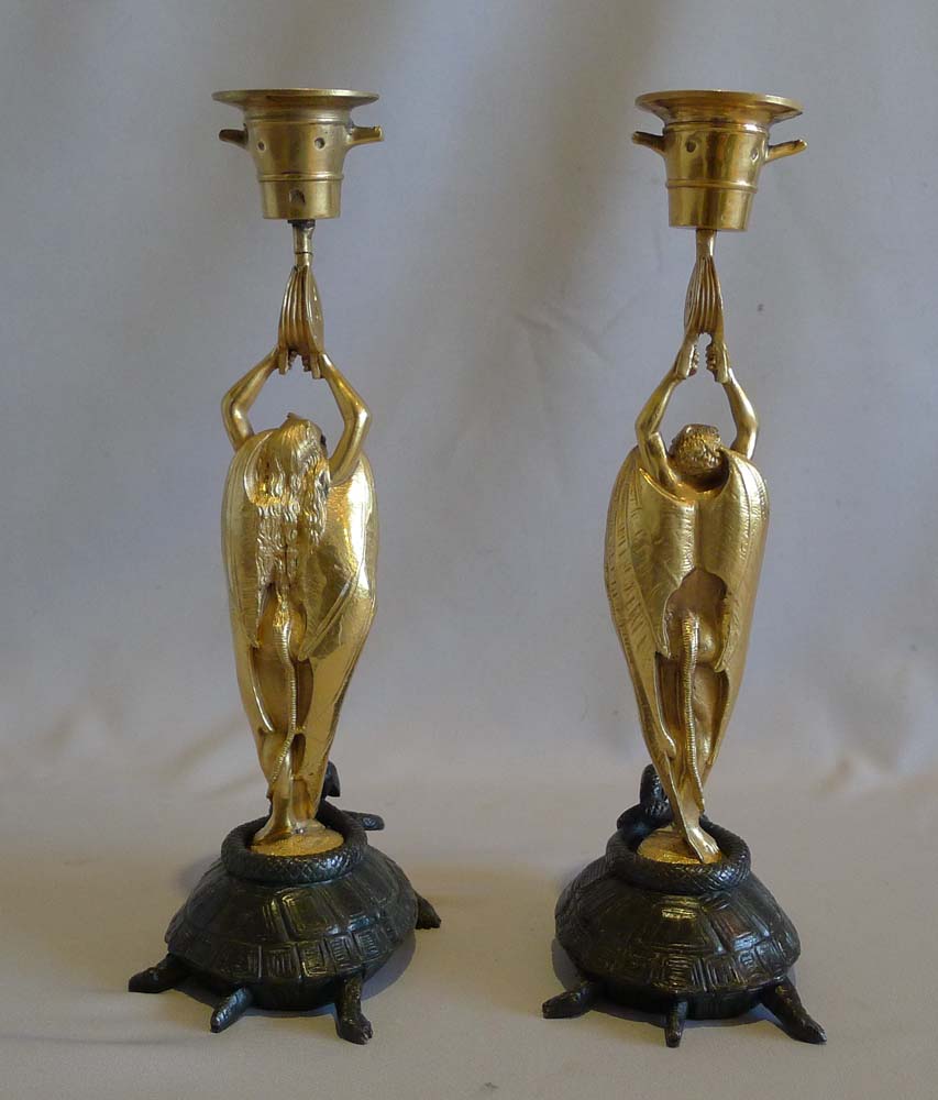 Antique pair of very unusual figural devil bronze candlesticks.
