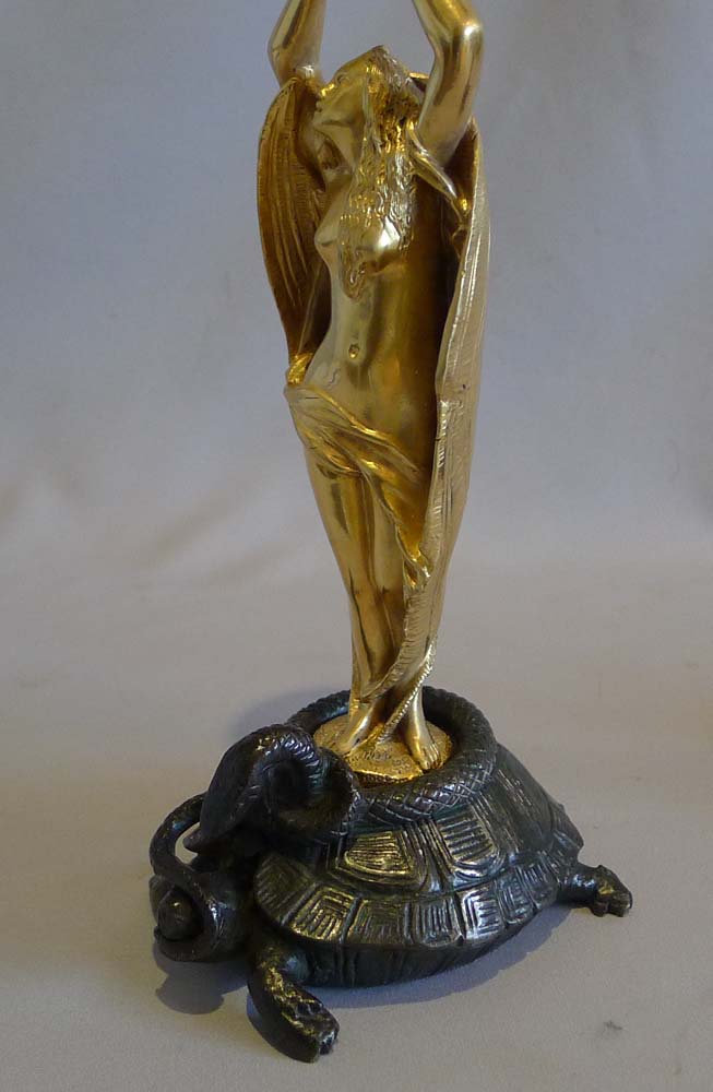 Antique pair of very unusual figural devil bronze candlesticks.