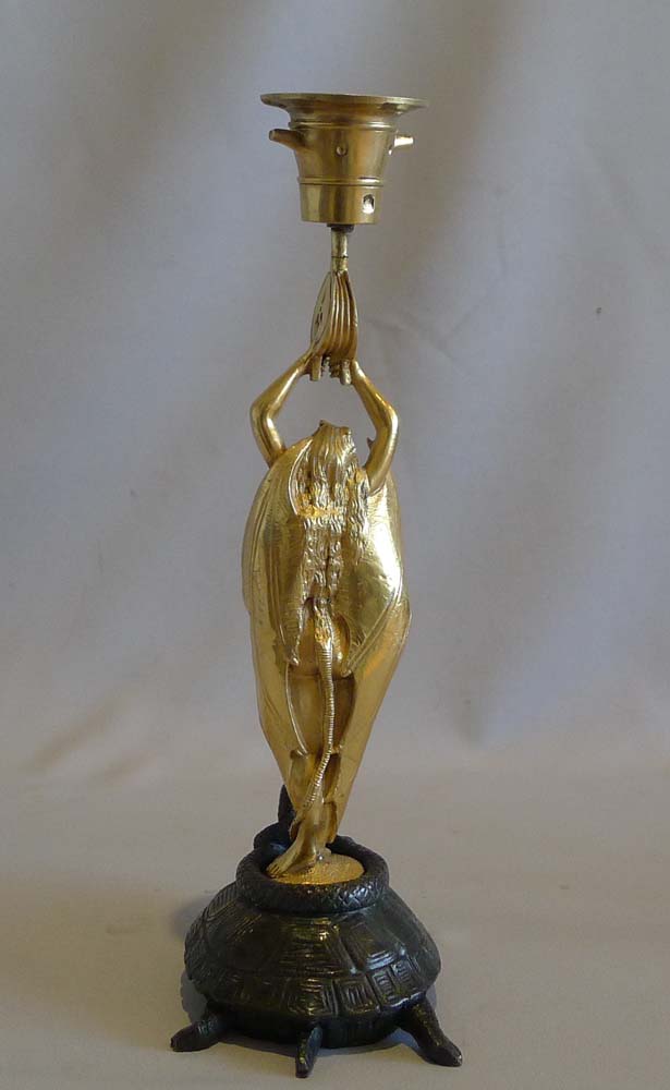 Antique pair of very unusual figural devil bronze candlesticks.