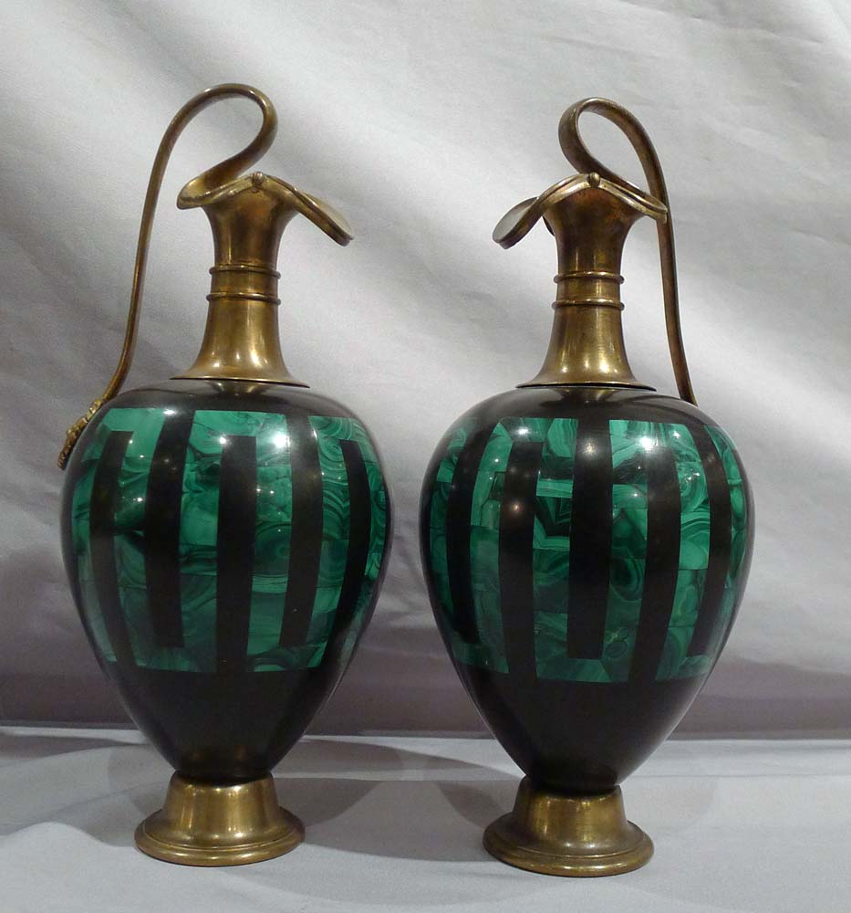 Antique pair of Russian malachite and black marble vases with ormolu mounts.