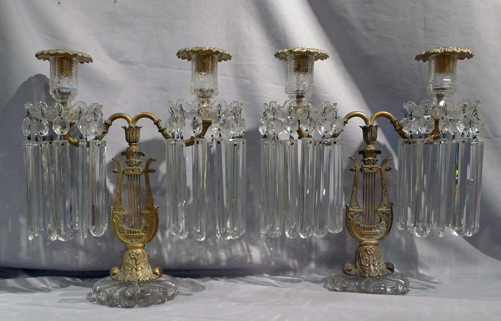 Antique pair of ormolu and cut glass table lustres.