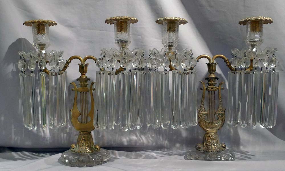 Antique pair of ormolu and cut glass table lustres.