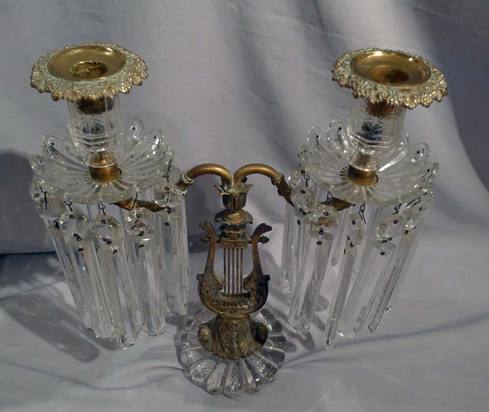 Antique pair of ormolu and cut glass table lustres.