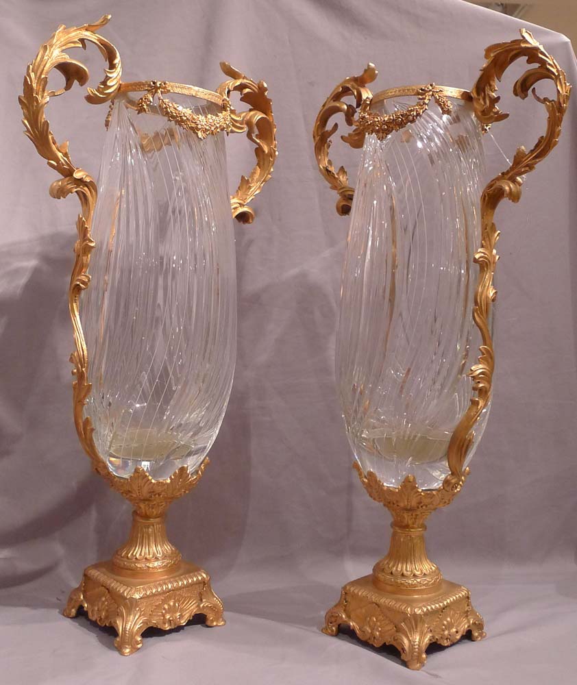 Pair of massive glass and gilt bronze vases.