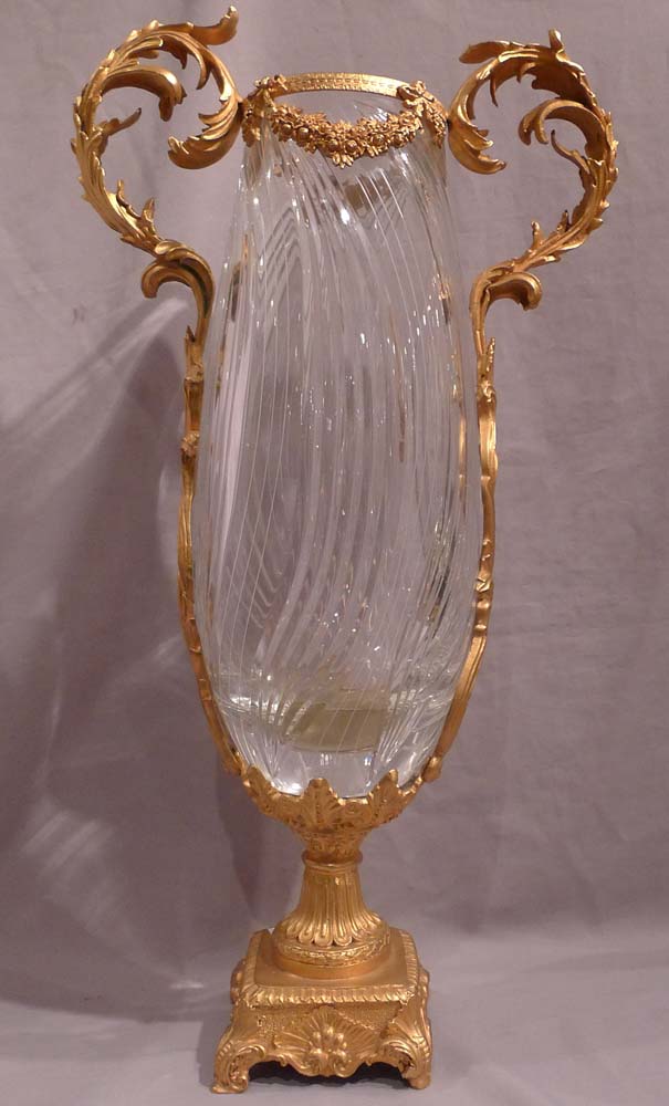 Pair of massive glass and gilt bronze vases.