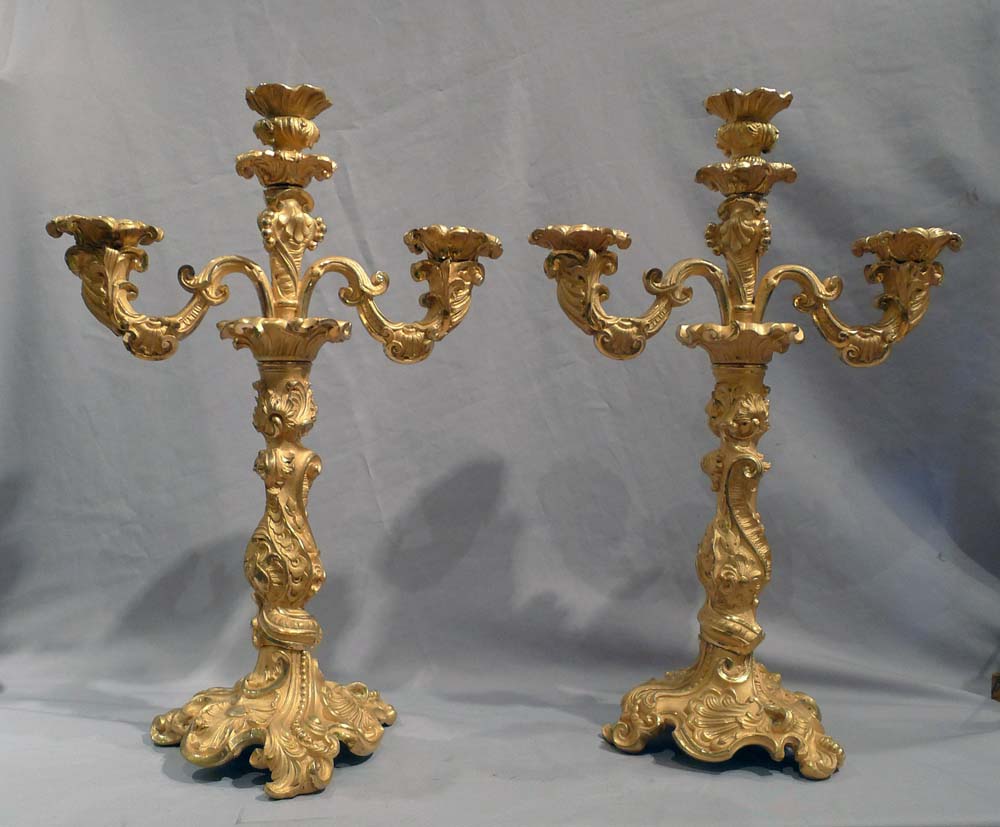 Antique pair of French 19th century ormolu candelabra.
