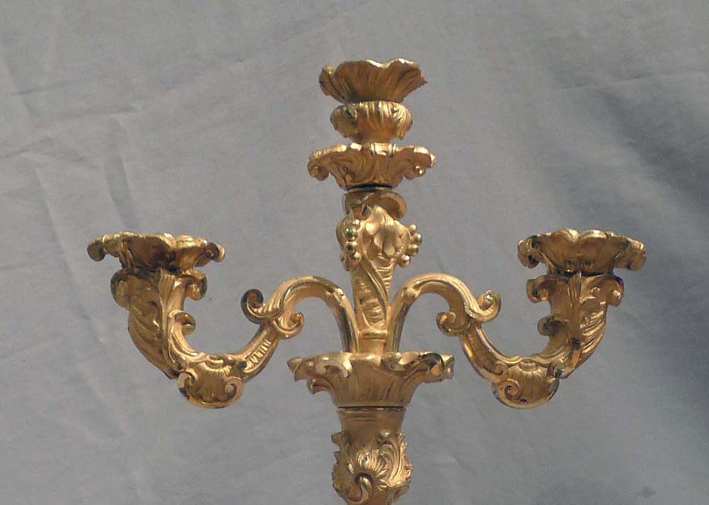 Antique pair of French 19th century ormolu candelabra.