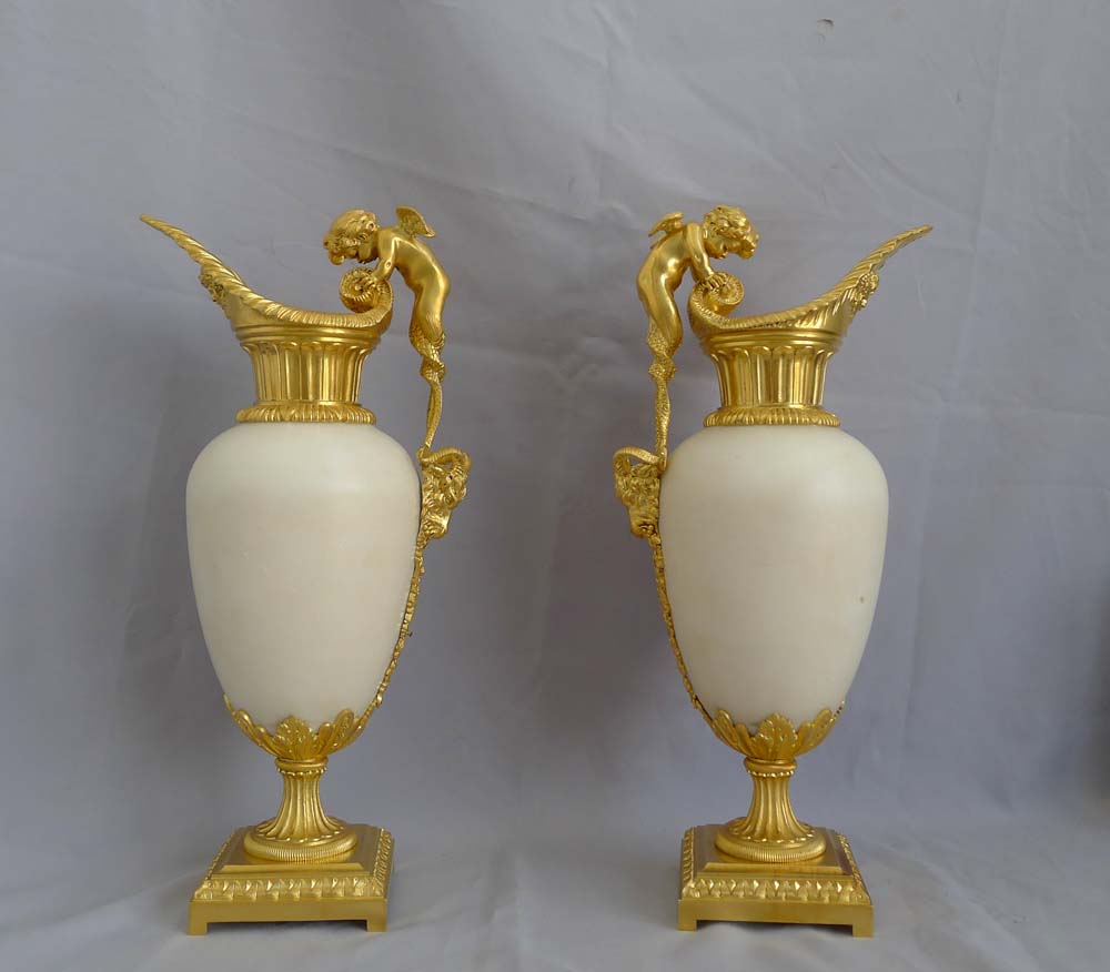 Antique Pair of French ormolu and white marble decorative ewers of outstanding quality.