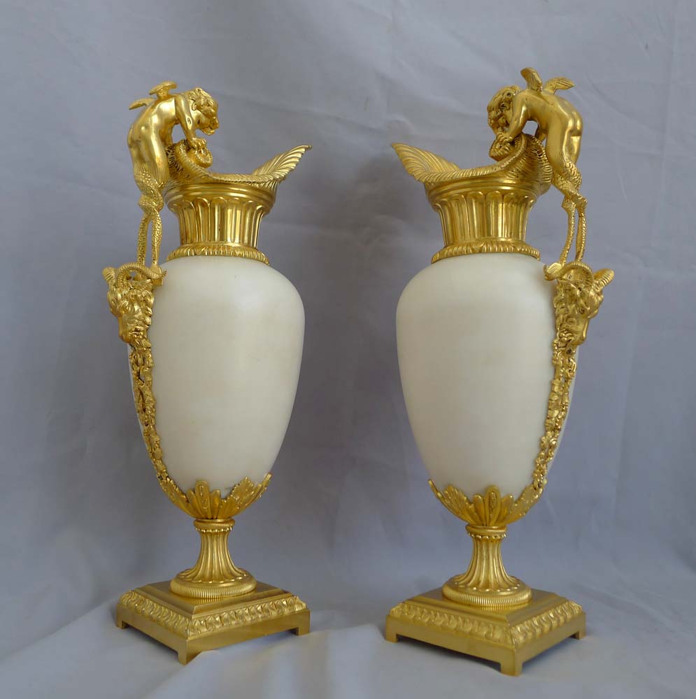 Antique Pair of French ormolu and white marble decorative ewers of outstanding quality.