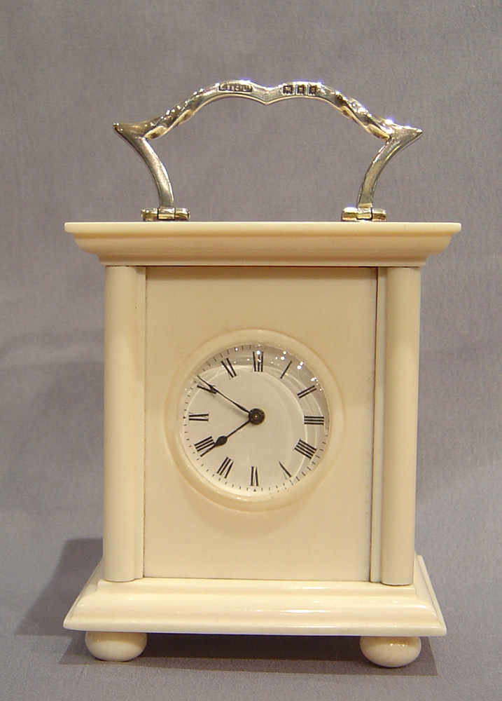 English Ivory & silver carriage clock.