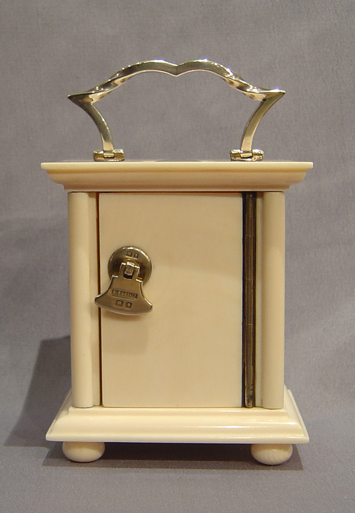 English Ivory & silver carriage clock.