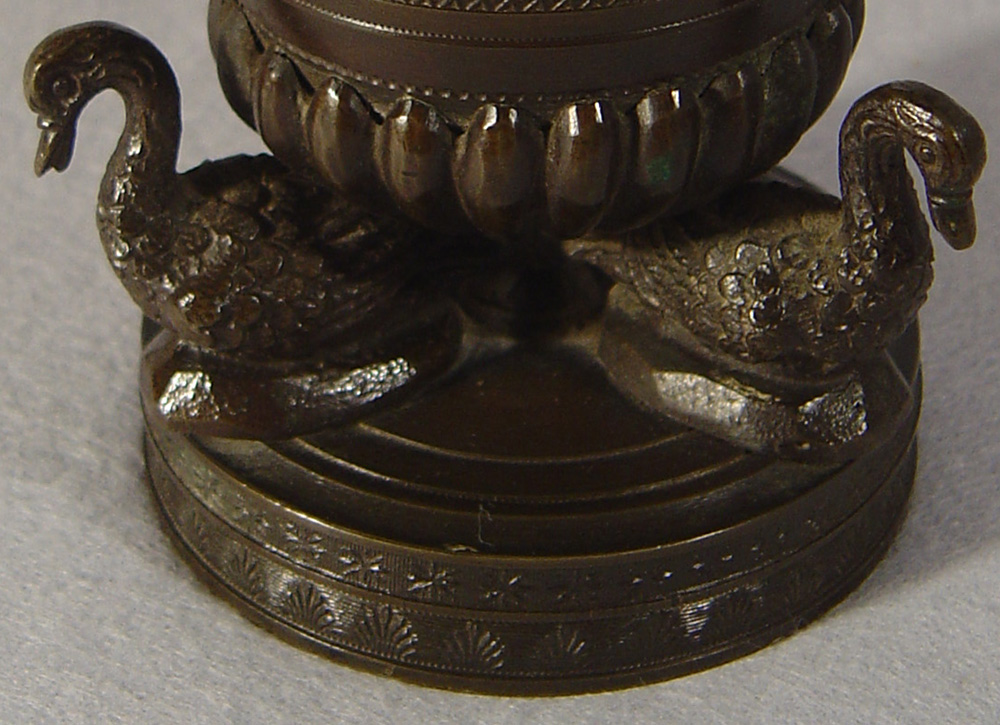 A fine antique English Regency patinated bronze pastille burner.