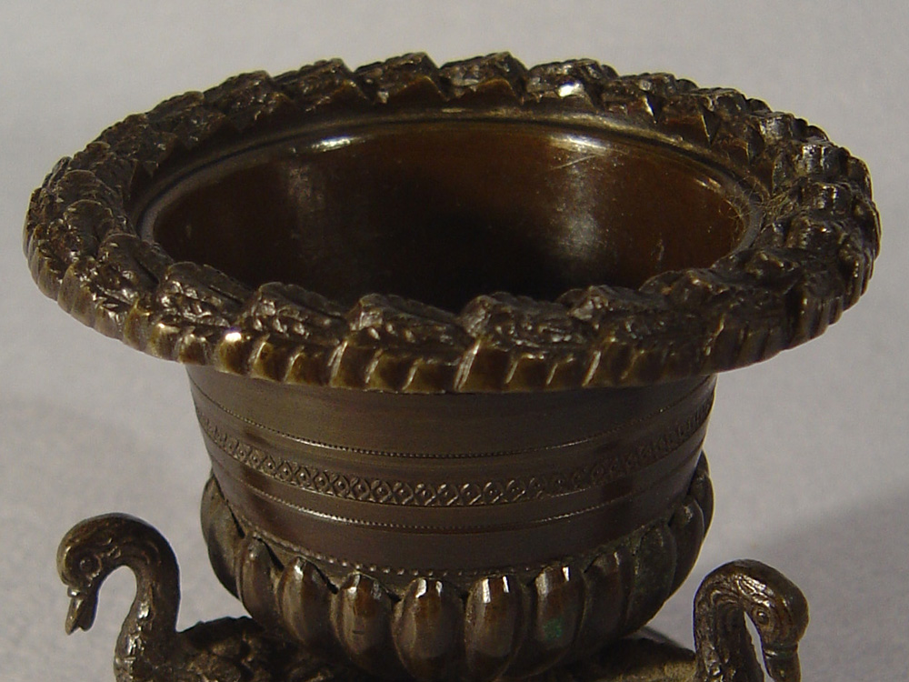 A fine antique English Regency patinated bronze pastille burner.