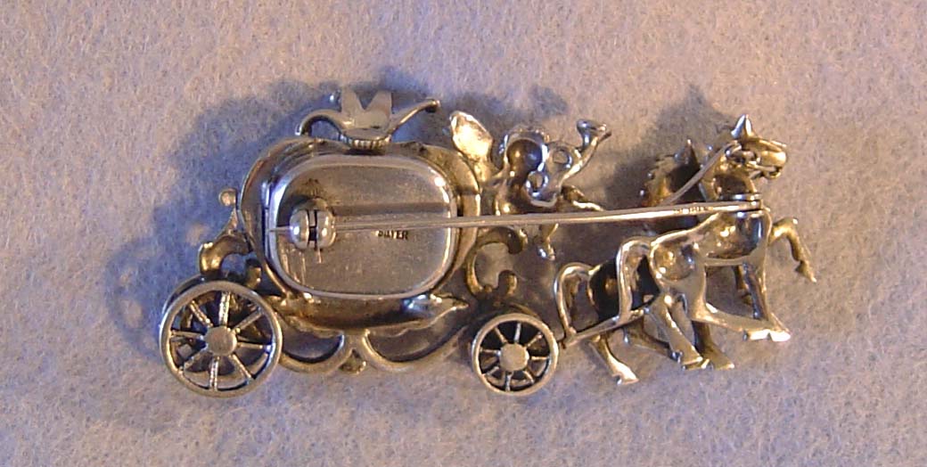 Silver and marquesite watch broach.