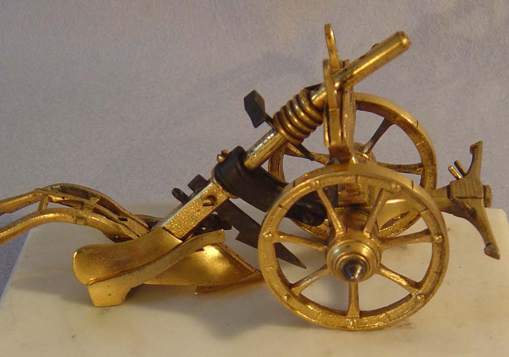 Antique English Victorian Arcadian ormolu and marble card or letter tidy in the form of a plough.