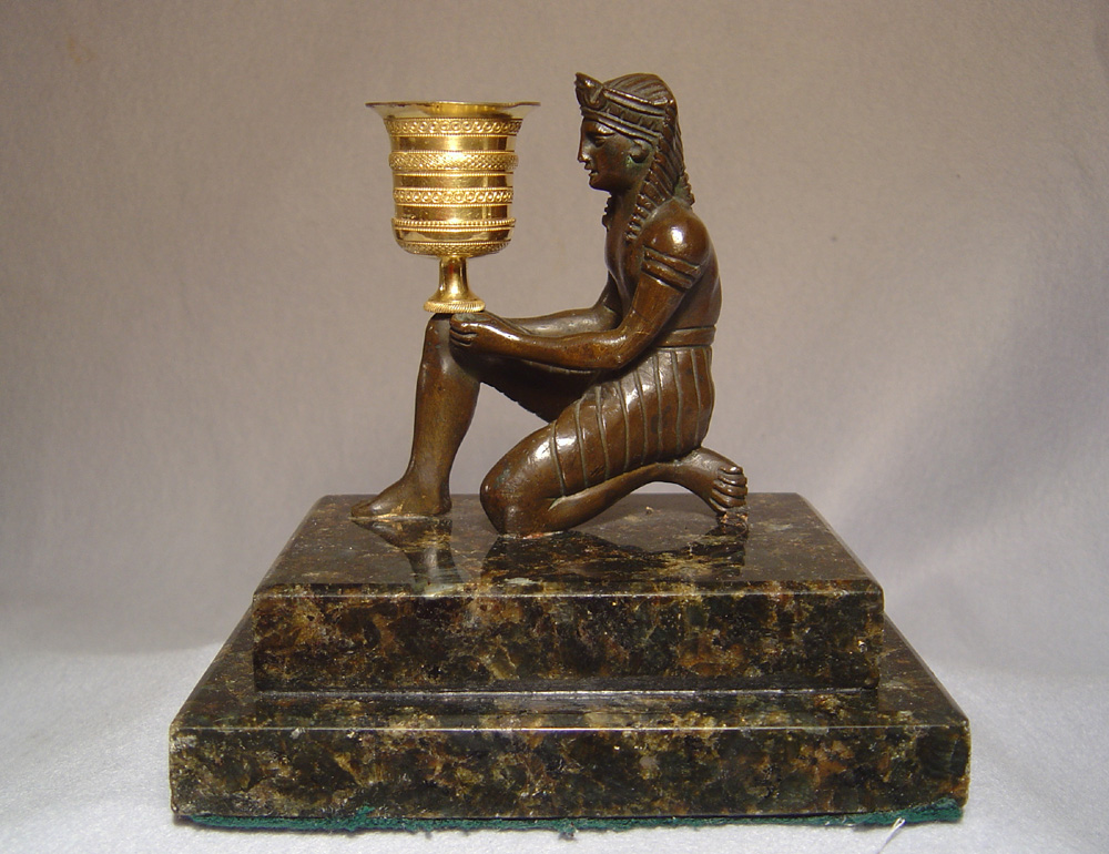 Antique French/English gout d'egypt patinated bronze and ormolu candlestick on felspar base.