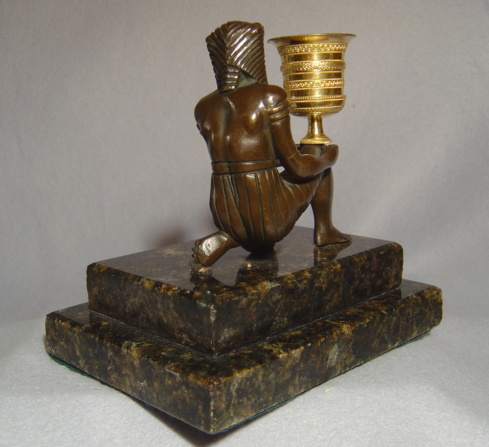 Antique French/English gout d'egypt patinated bronze and ormolu candlestick on felspar base.