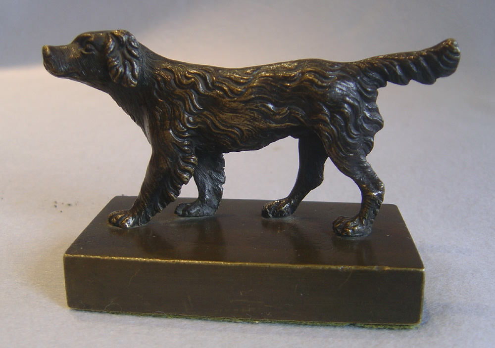 Antique English Regency patinated bronze of a Spaniel.