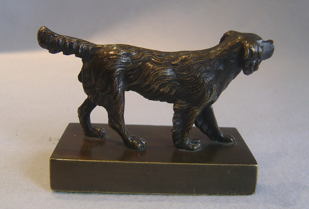 Antique English Regency patinated bronze of a Spaniel.