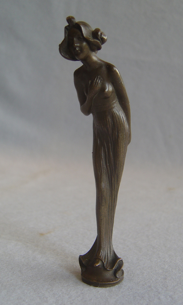 Art Nouveau patinated bronze figural seal signed