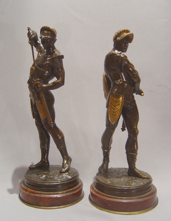 Pair French bronze gladiators on marble bases by Lalouette.