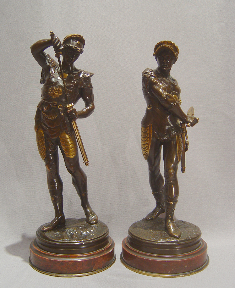 Pair French bronze gladiators on marble bases by Lalouette.