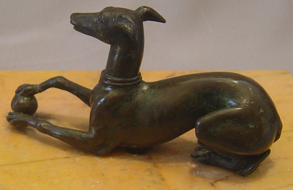 Recumbant greyhound on Sienna marble base