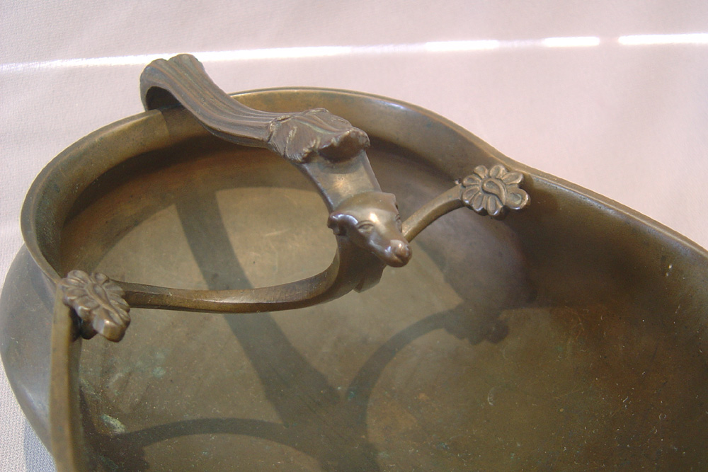 Antique Italian Grand Tour grain scoop in the Rennaissance style.