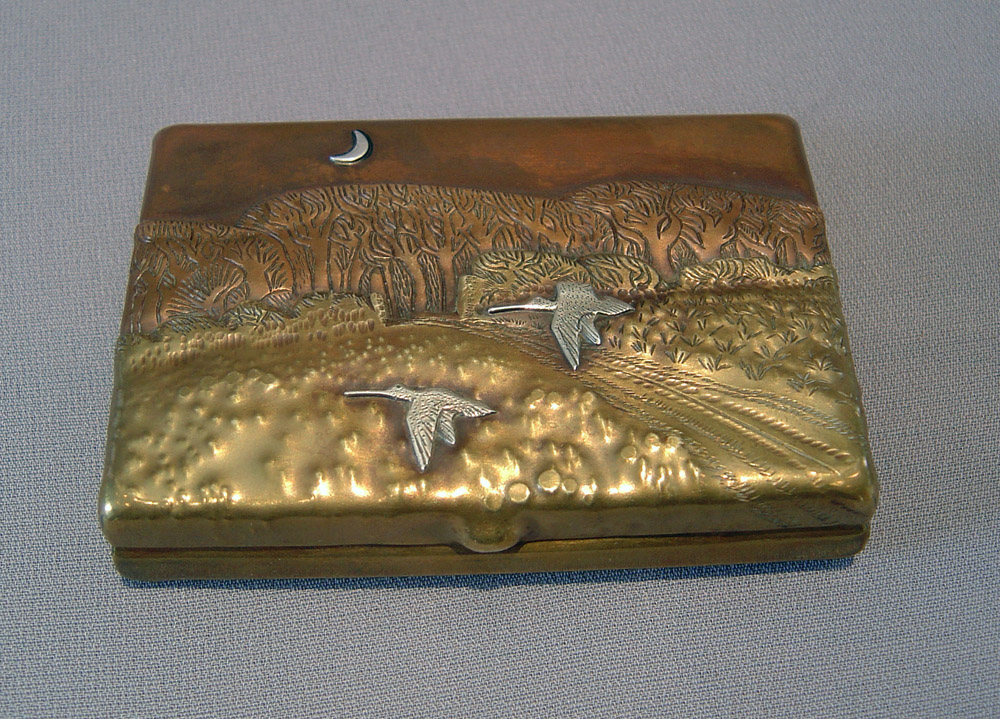 Two Arts and Crafts bronze, copper and silver boxes