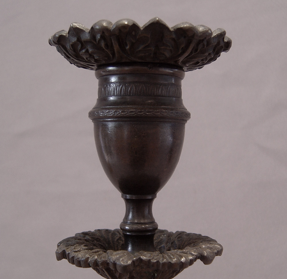 Magnificent antique English Regency pair of patinated bronze greyhound candlesticks.