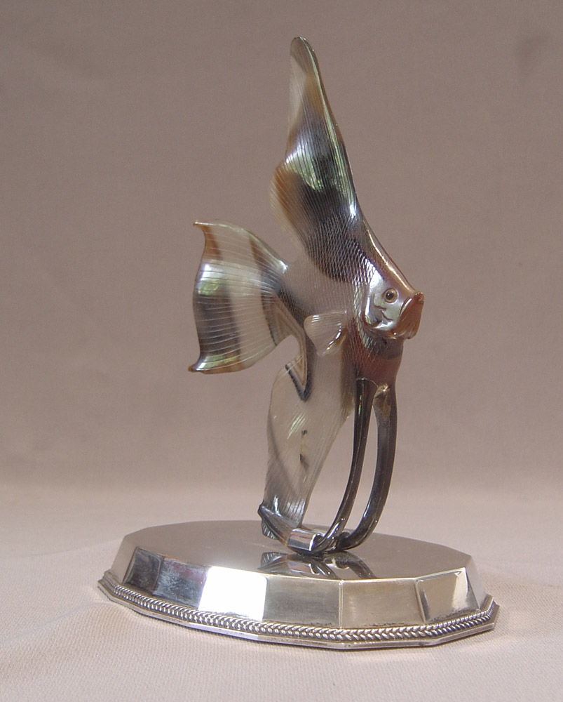 Agate Angel fish set on silver base.