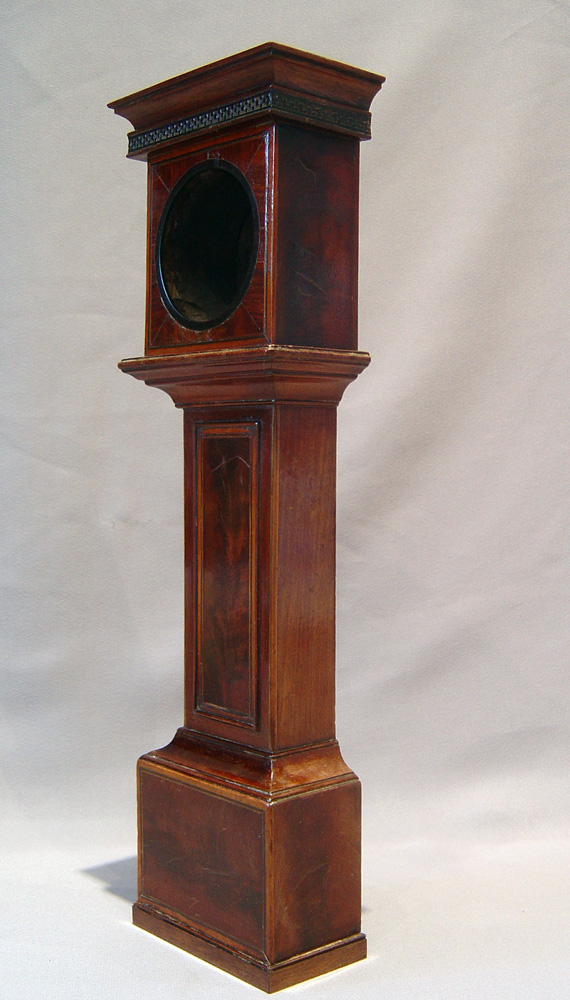 Watch stand in form of inlaid mahogany longcase clock.
